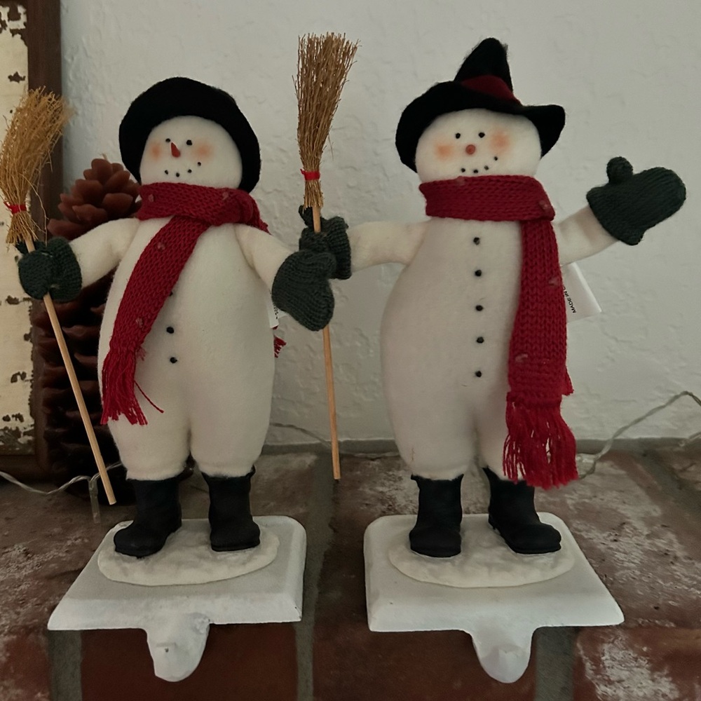 Festive Snowman stocking holders, set of two.
